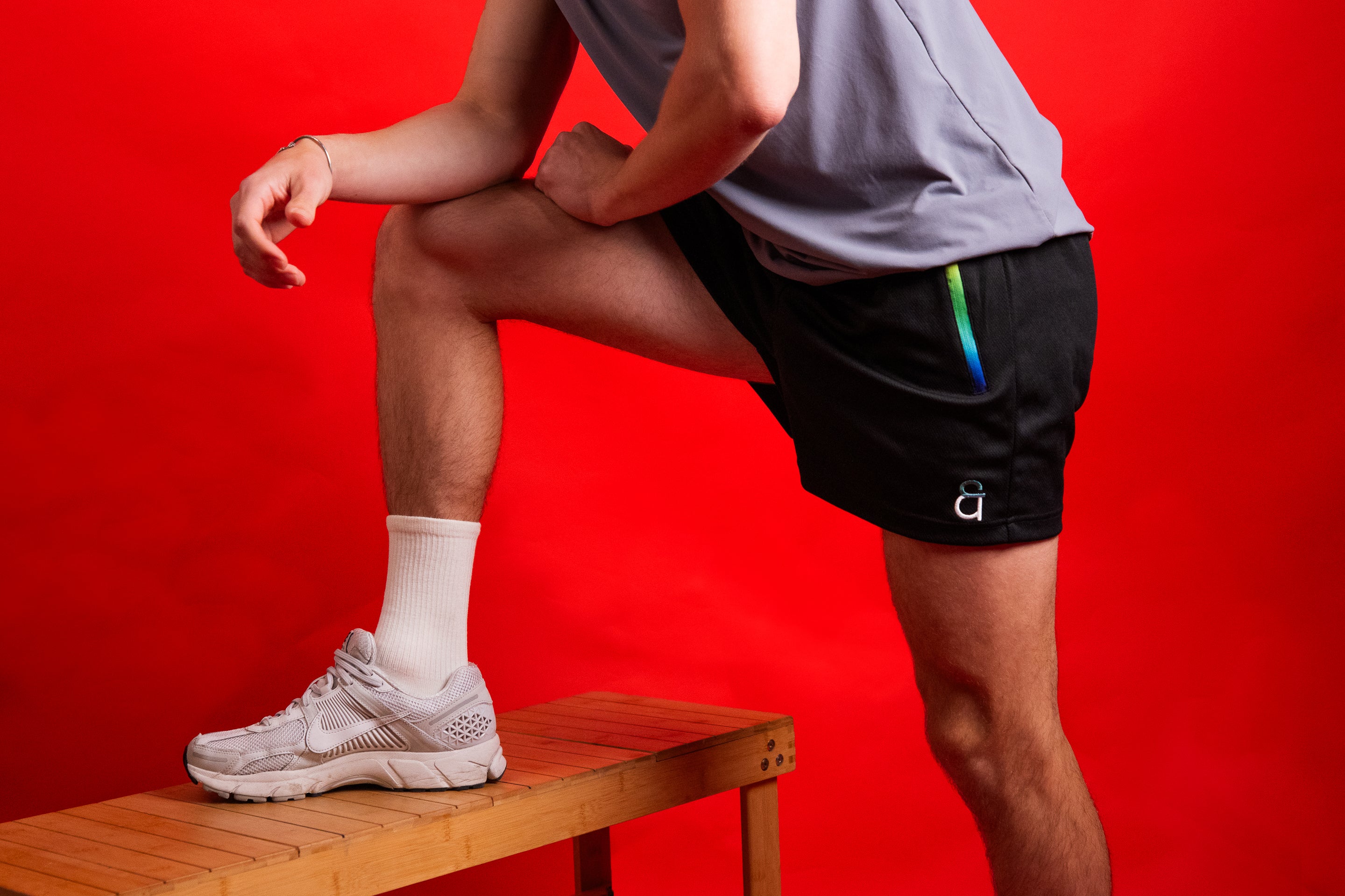 Prism shorts with red background.